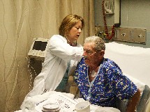 Dr. Lauren Koniaris assisting a patient 